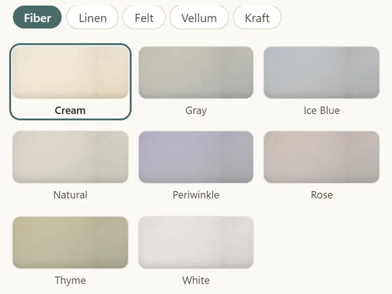 The paper picker: five grain chips above eight colour swatches, with Fiber Cream selected